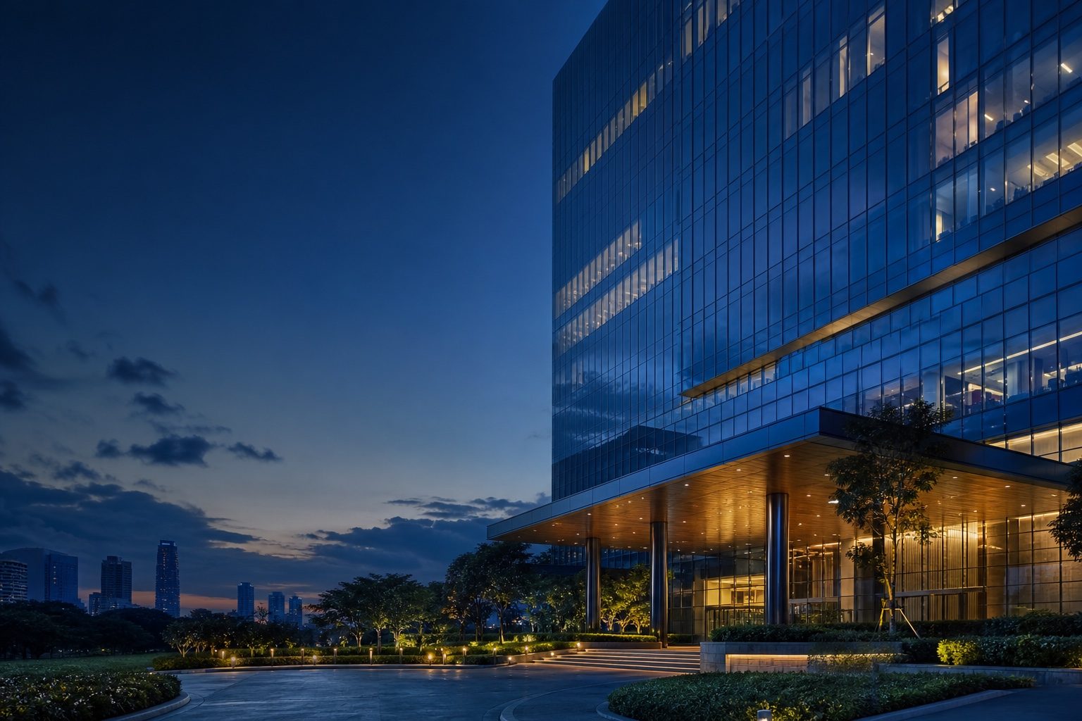 A corporate office building at dusk